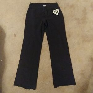 Black sweatpants with a heart on the front